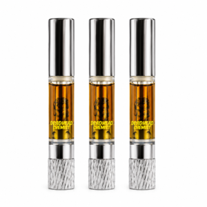 Three one milliliter clear glass oil cells arranged side by side on a clean white background